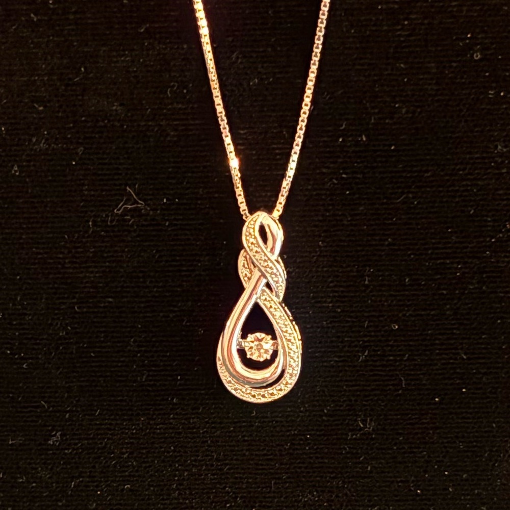 Elegant Sterling Silver and Diamond Pendant Necklace